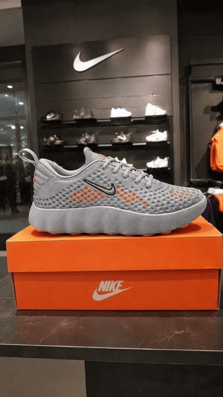 files/magnific_photo-a-gray-nike-sneaker_l7jn7h8gv9_1.png
